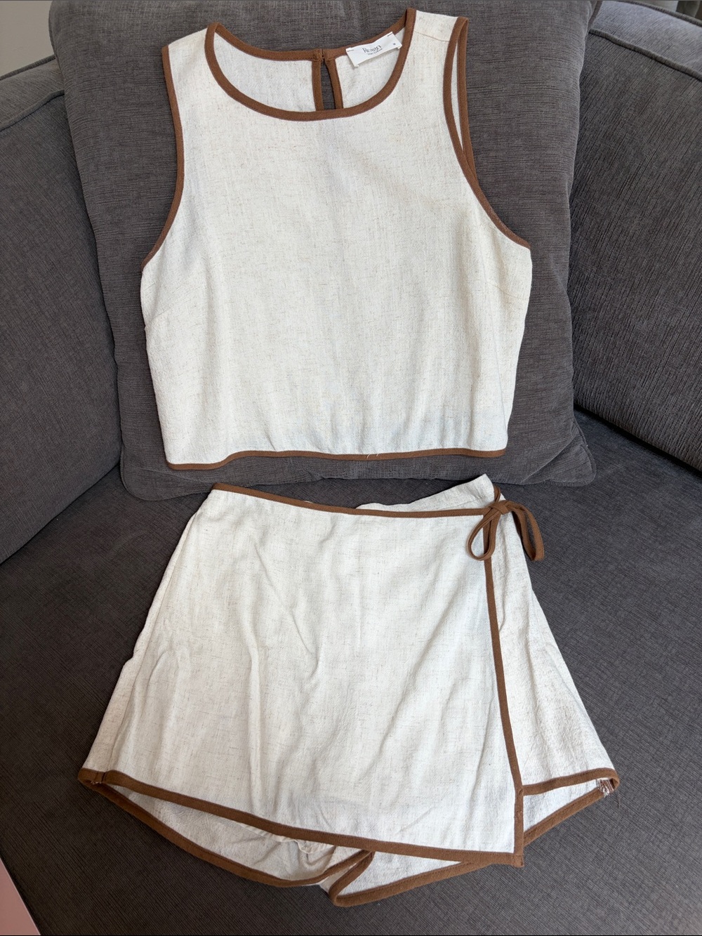 Two-Piece Cream Tank and Wrap Skort Set with Brown Trim